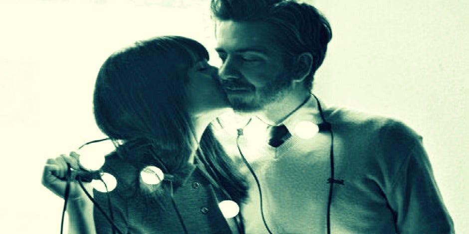 couple surrounded by lights couple surrounded by lights