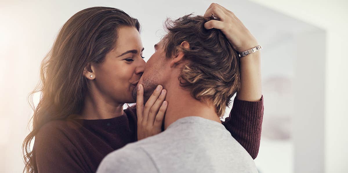 woman and man kissing