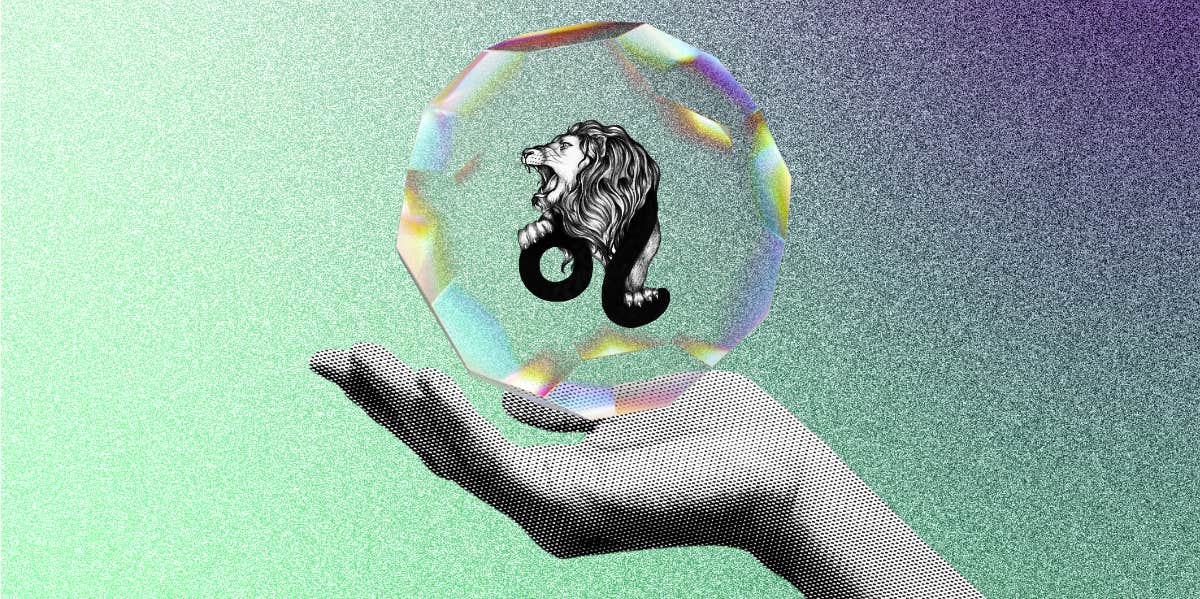 6 Best Crystals For Leo Energy hand holding crystal with leo symbols