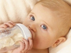 cute baby drinking milk