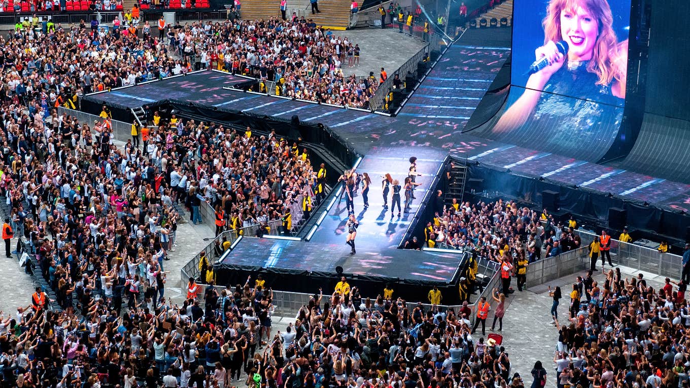 Taylor Swift performing at a concert in London