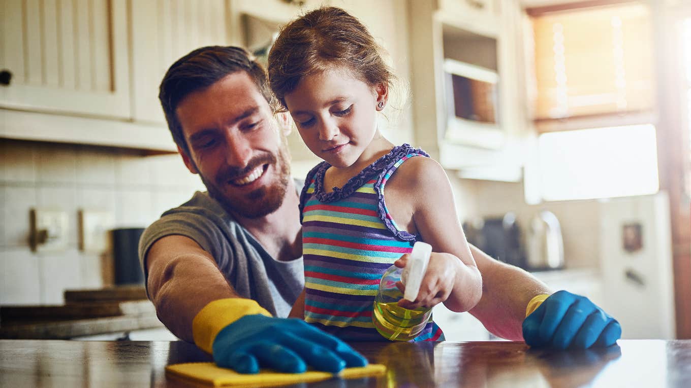 dad and daughter cleaning