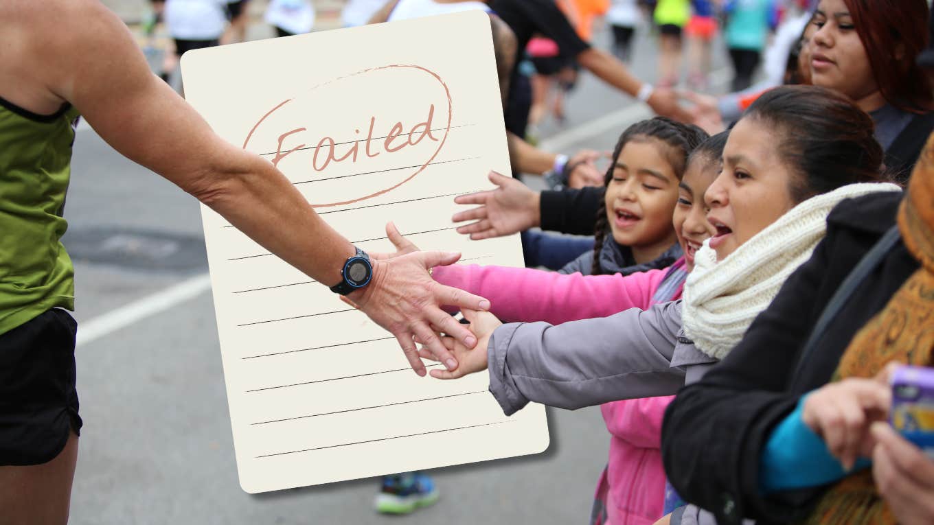 kids greeting runner in marathon
