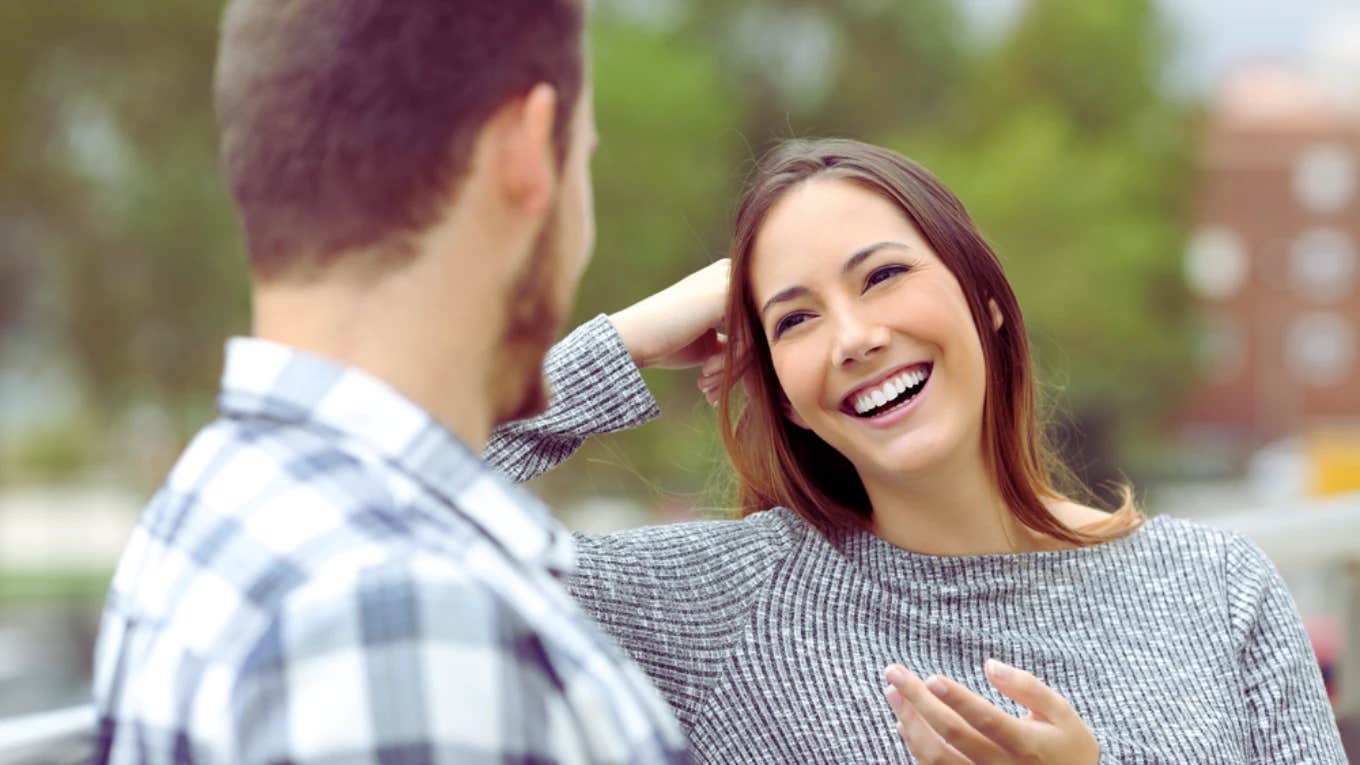 husband flirting with babysitter at park