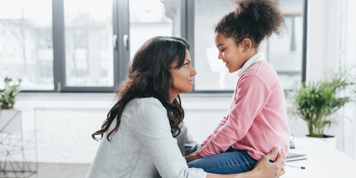 mom consoling daughter