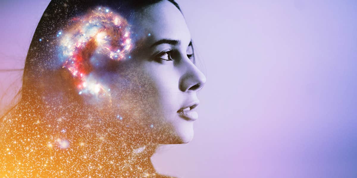 astrology and dark night of the soul Woman in blue tones, a swirling nebula superimposed over her image