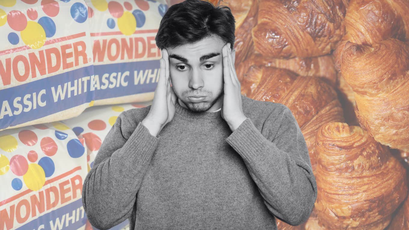 Man looking overwhelmed in front of Wonderbread and croissants. 