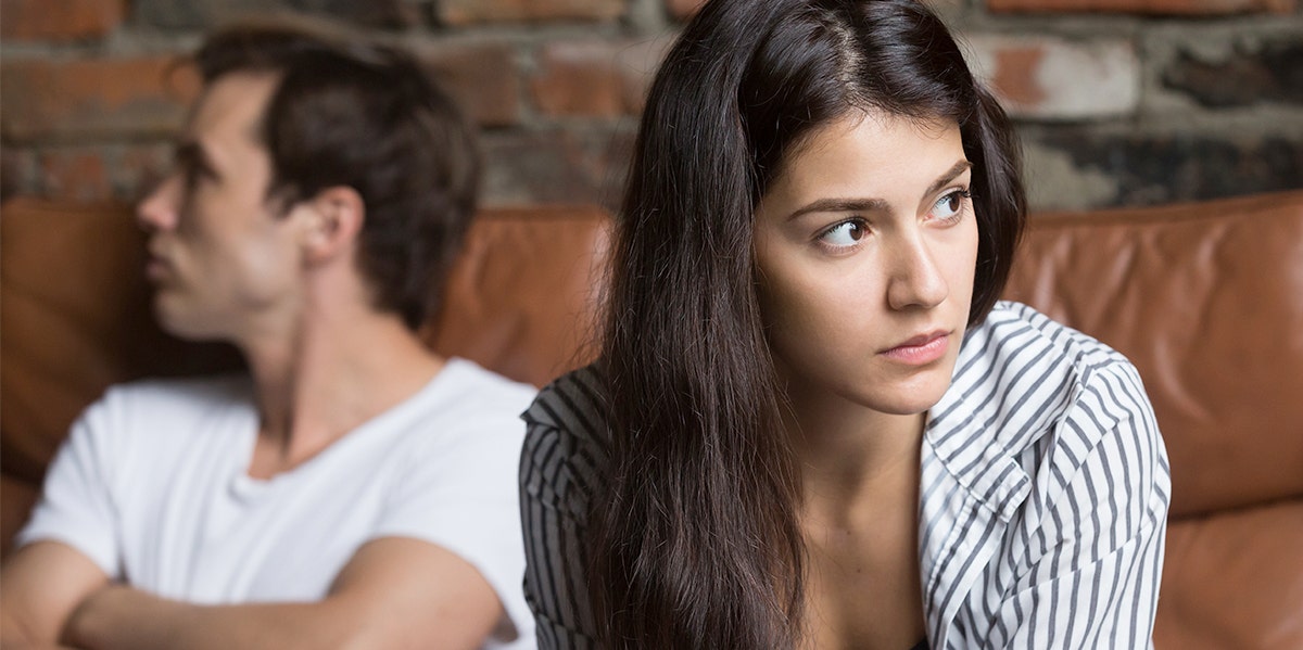 A Man Refused To Date Me Because I Looked Like His Aunt woman looking away from man who looks annoyed