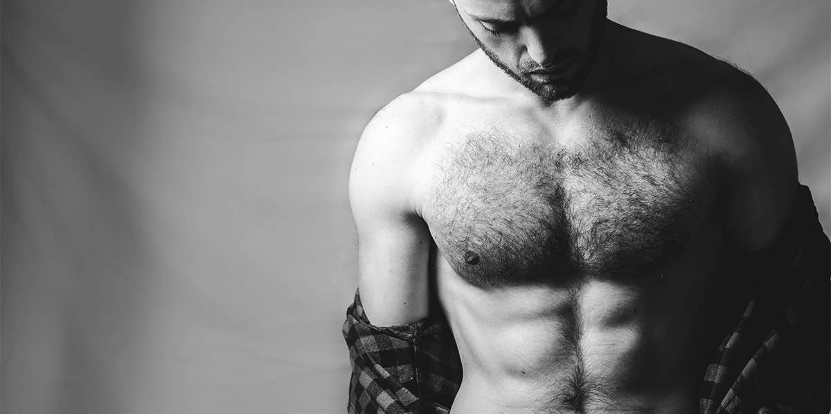 man with exposed hairy chest