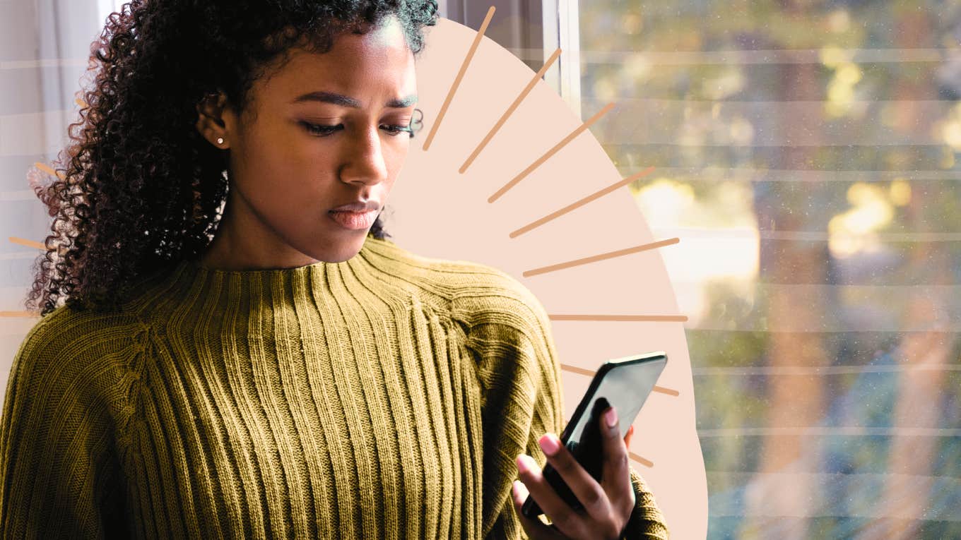 Woman staring at her phone after a seemingly good date