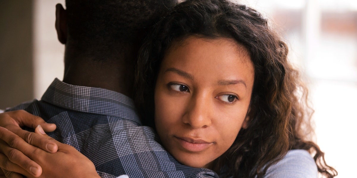 dating someone going through divorce woman hugging man going through a high conflict divorce