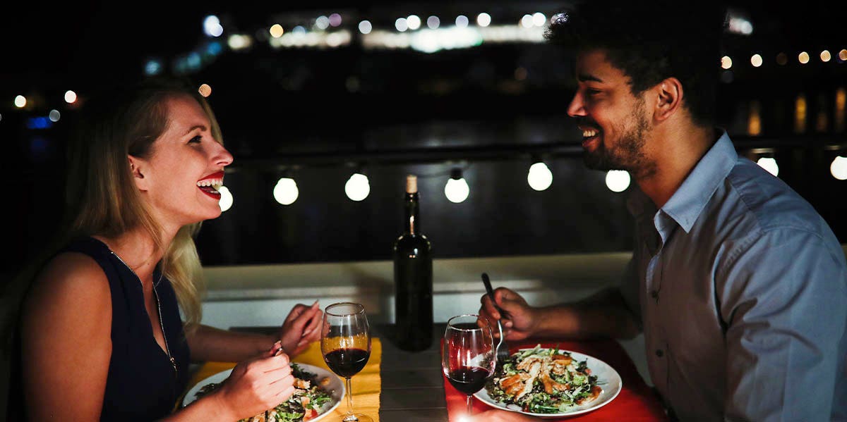 man and woman on nighttime date