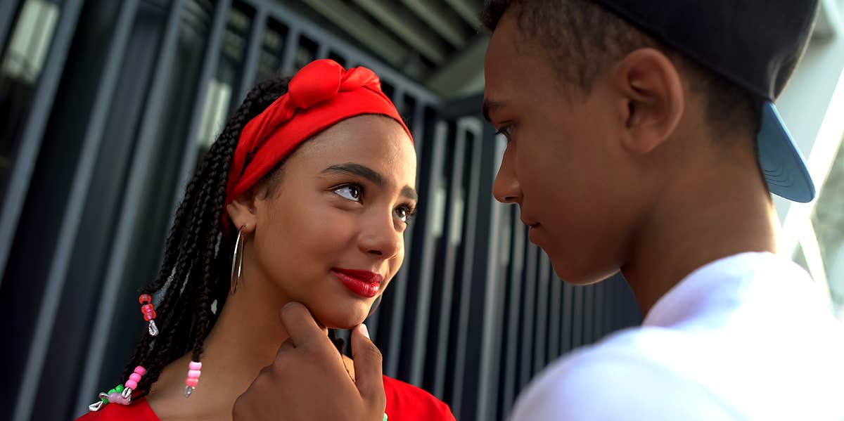 Flirty Ways Shy Girls Can Get A Guy's Attention — Without Saying A Word shy girl flirting with guy