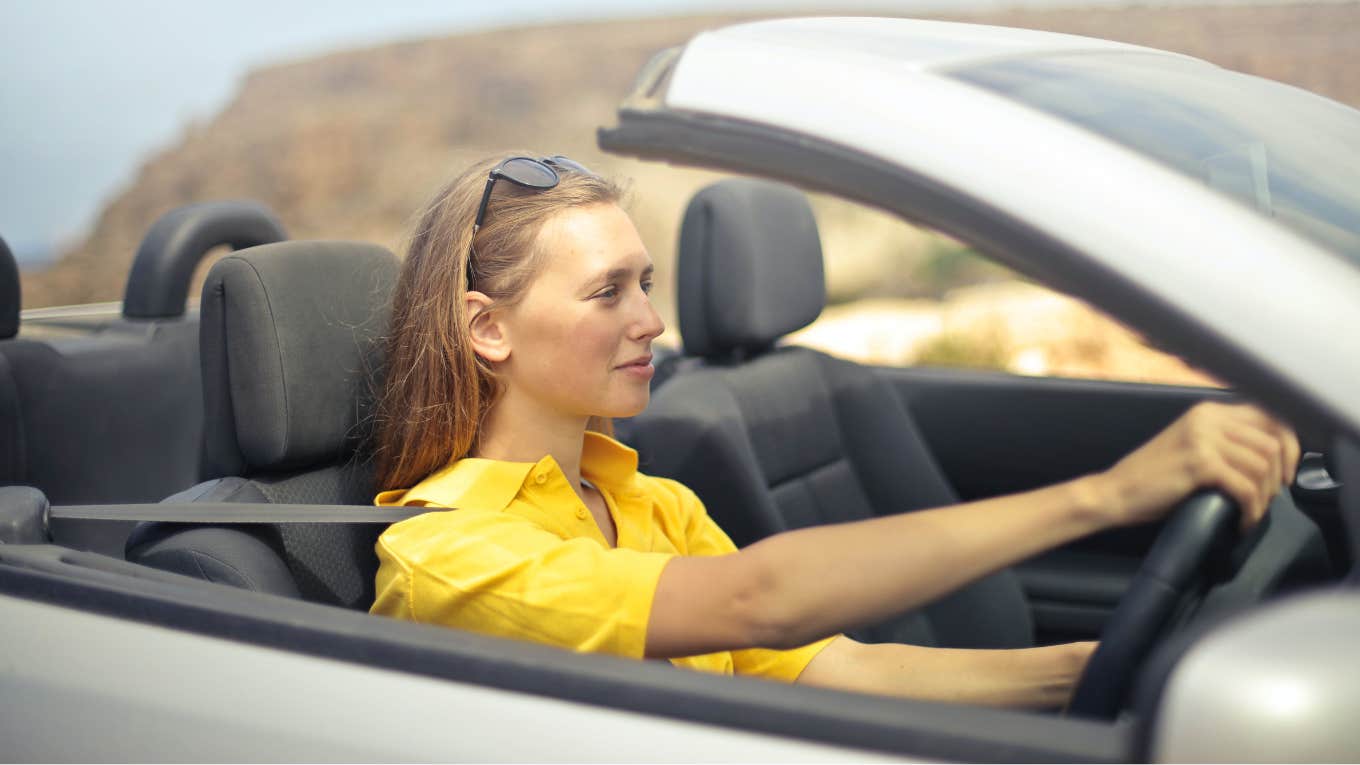 woman in a convertible 