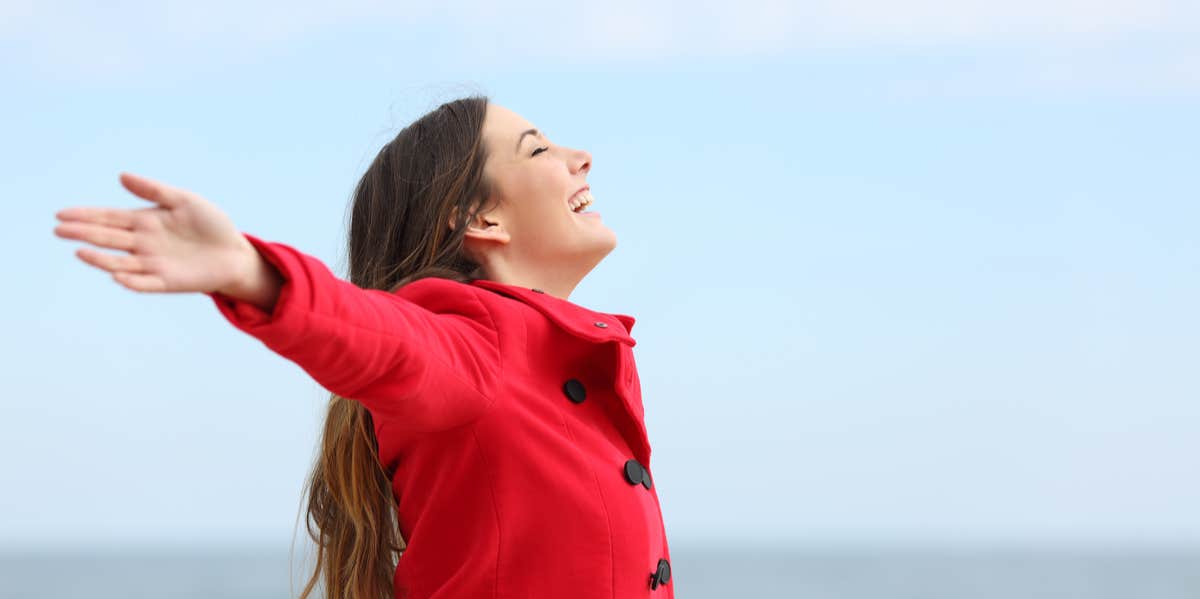 woman in a red coat