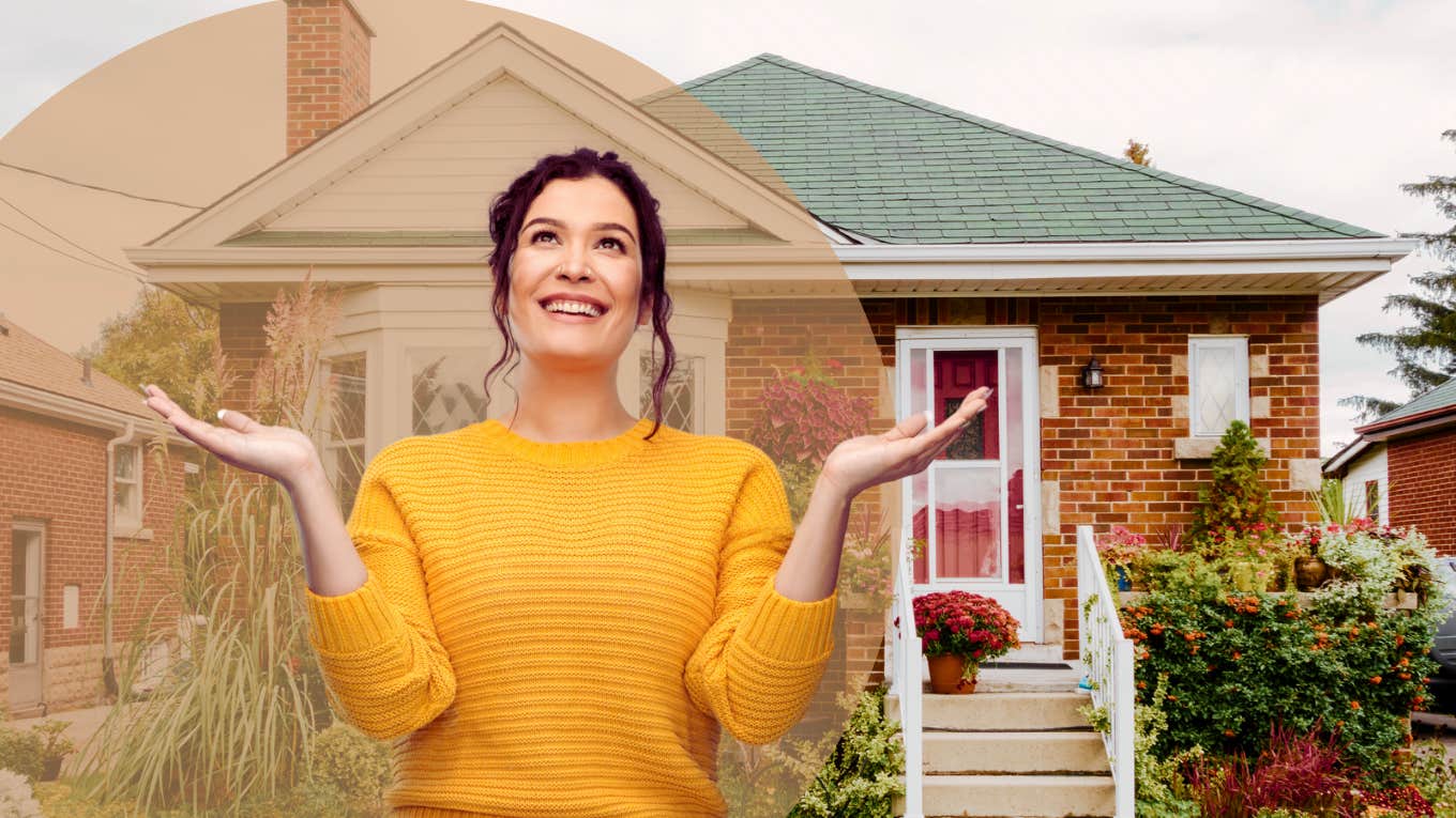 Woman standing in front of her homes doorstep 