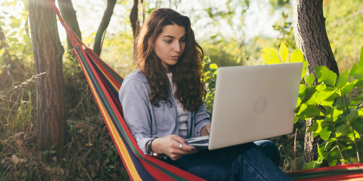 woman looking at laptop