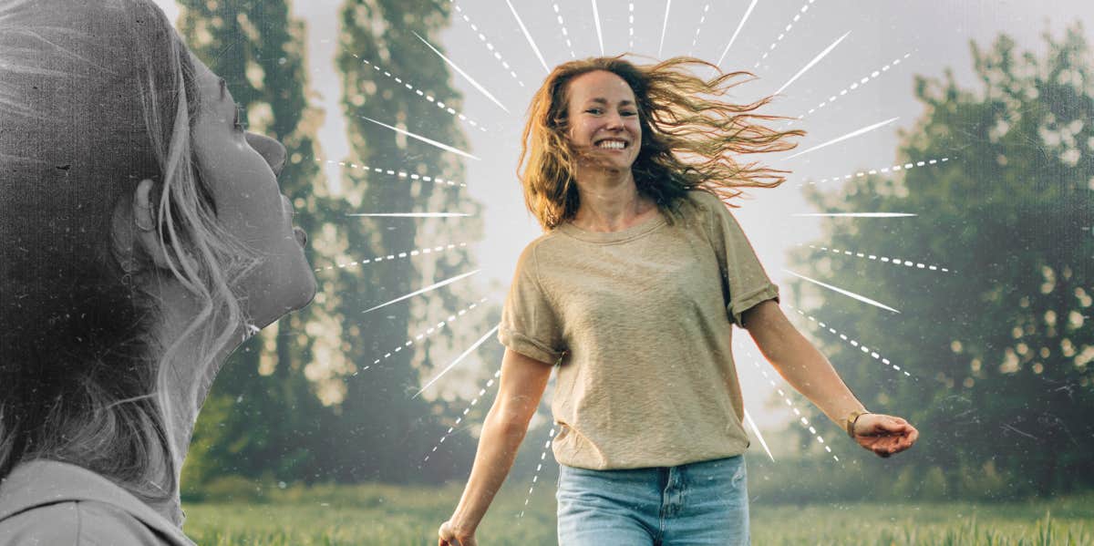 Happy woman outside in a grassy field