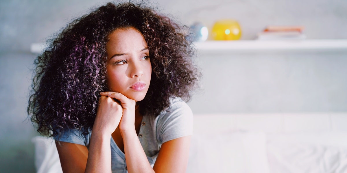decision fatigue tired woman trying to make a decision