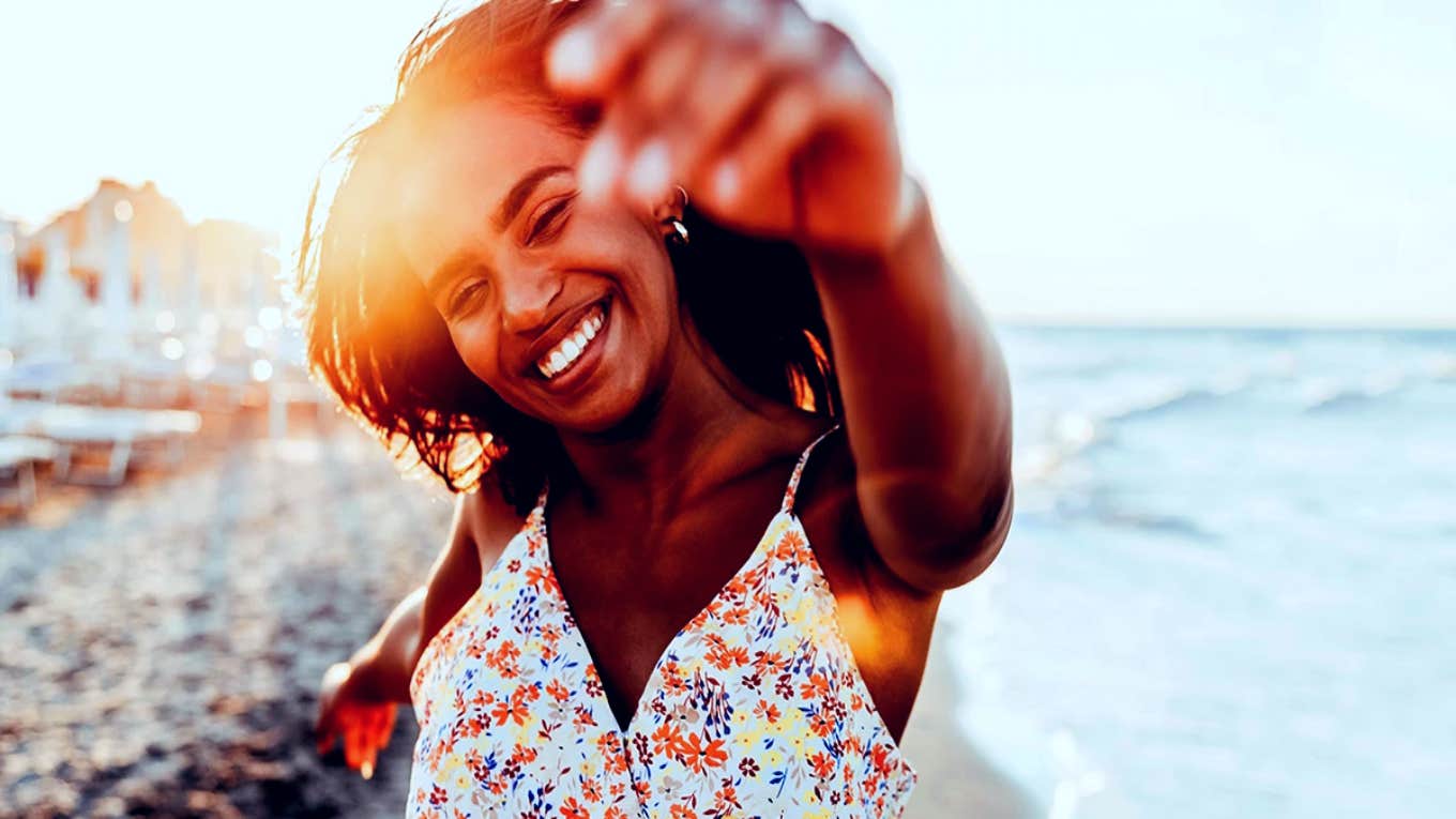 happy smiling woman on the beach