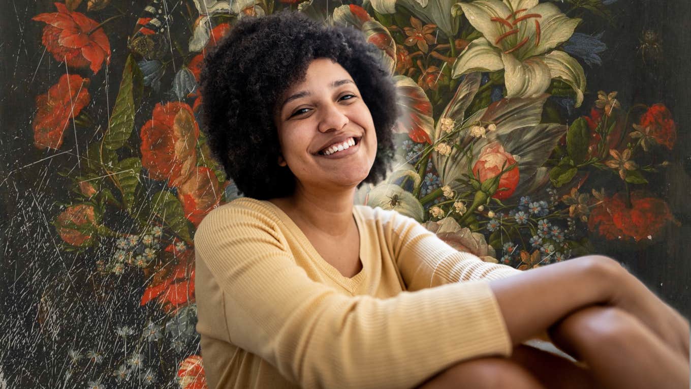 10 Deep, Soul-Searching Questions To Figure Out Who You Really Are Woman sitting down with a smile