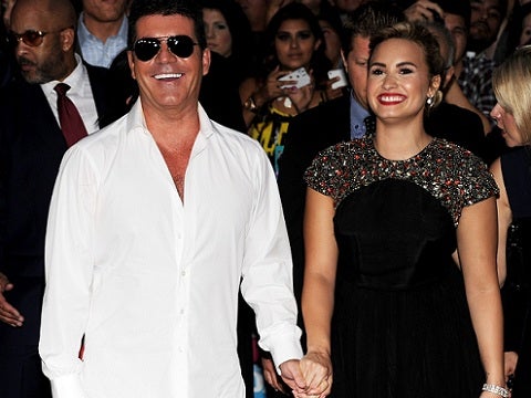 Simon Cowell and Demi Lovato of 'X Factor'