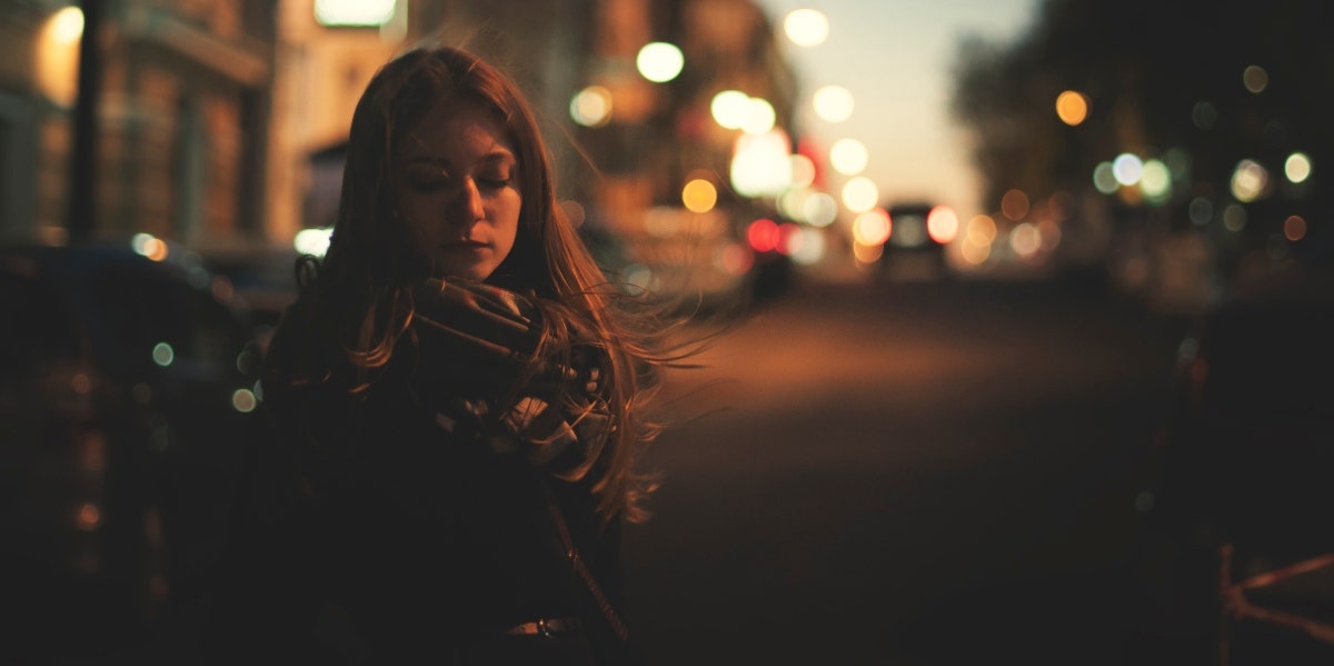 woman outdoors in the dark