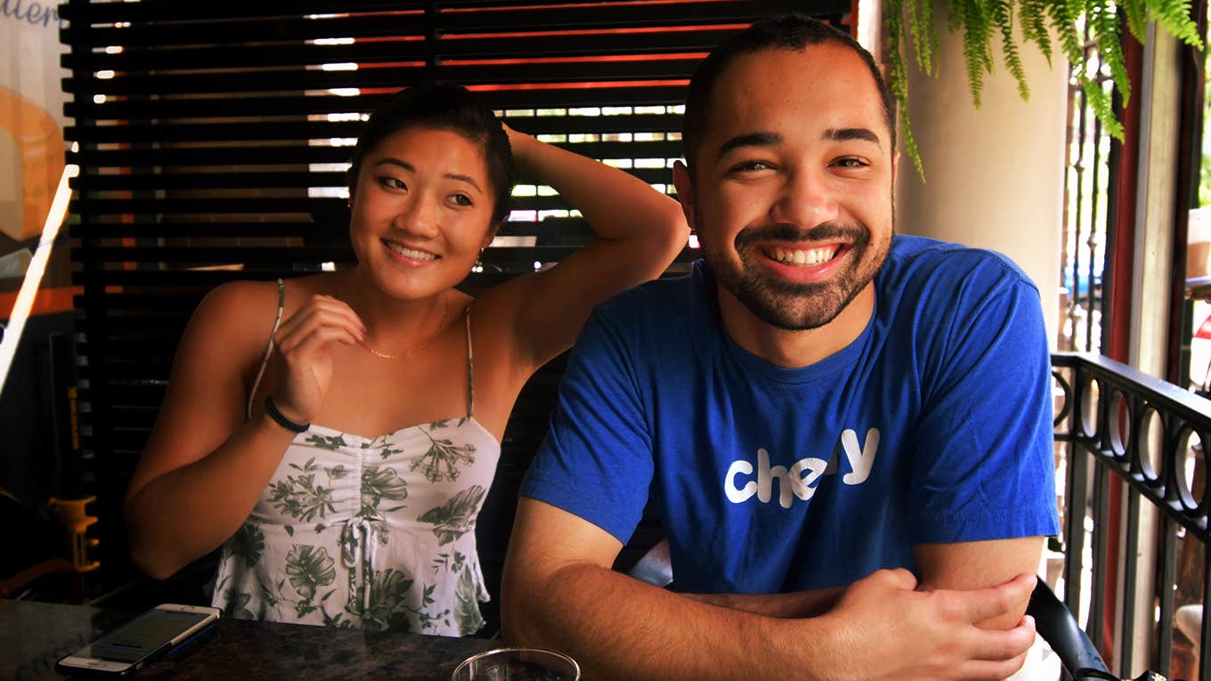 a man and a woman sitting at a table