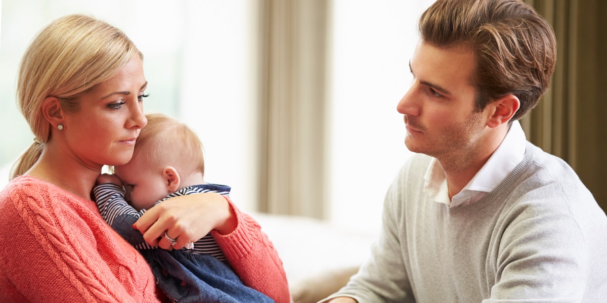 I Didn't Love My Husband As Much Once We Had Kids mom and dad with baby