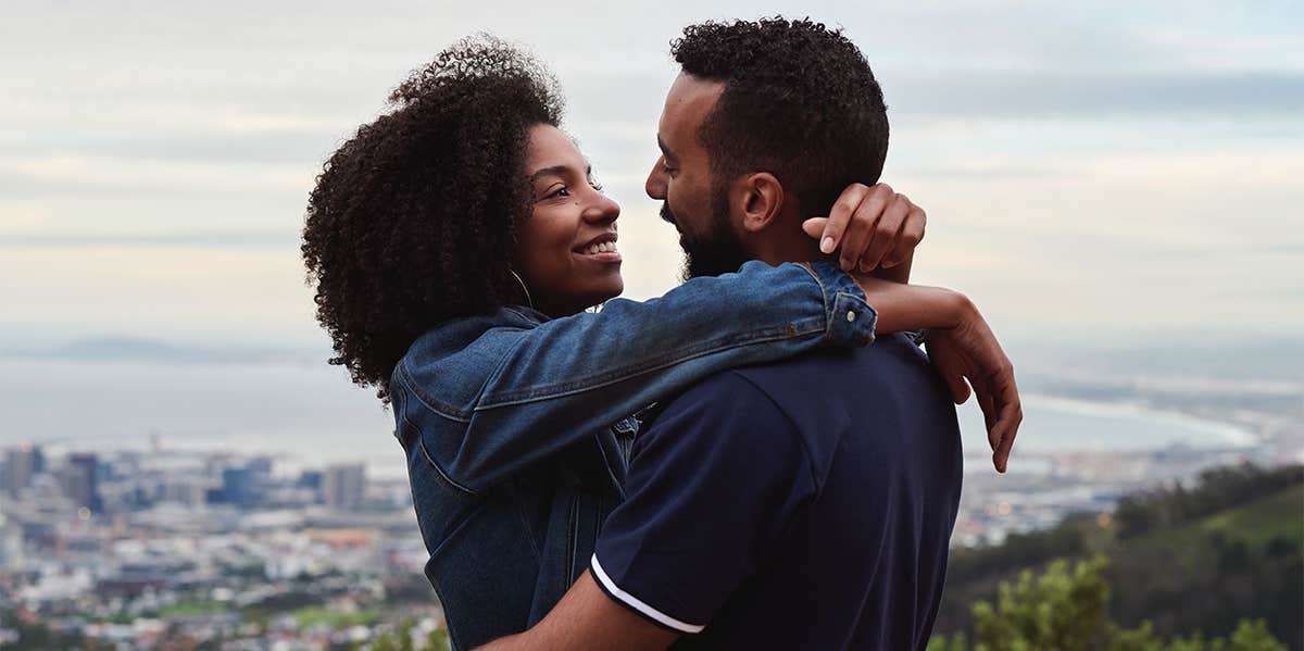 man and woman embracing