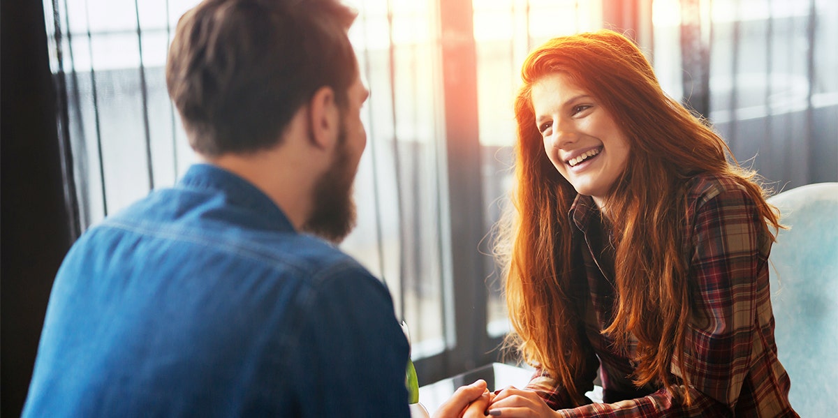 man and woman talking