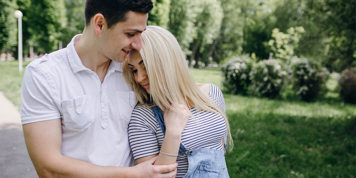 woman hugging man