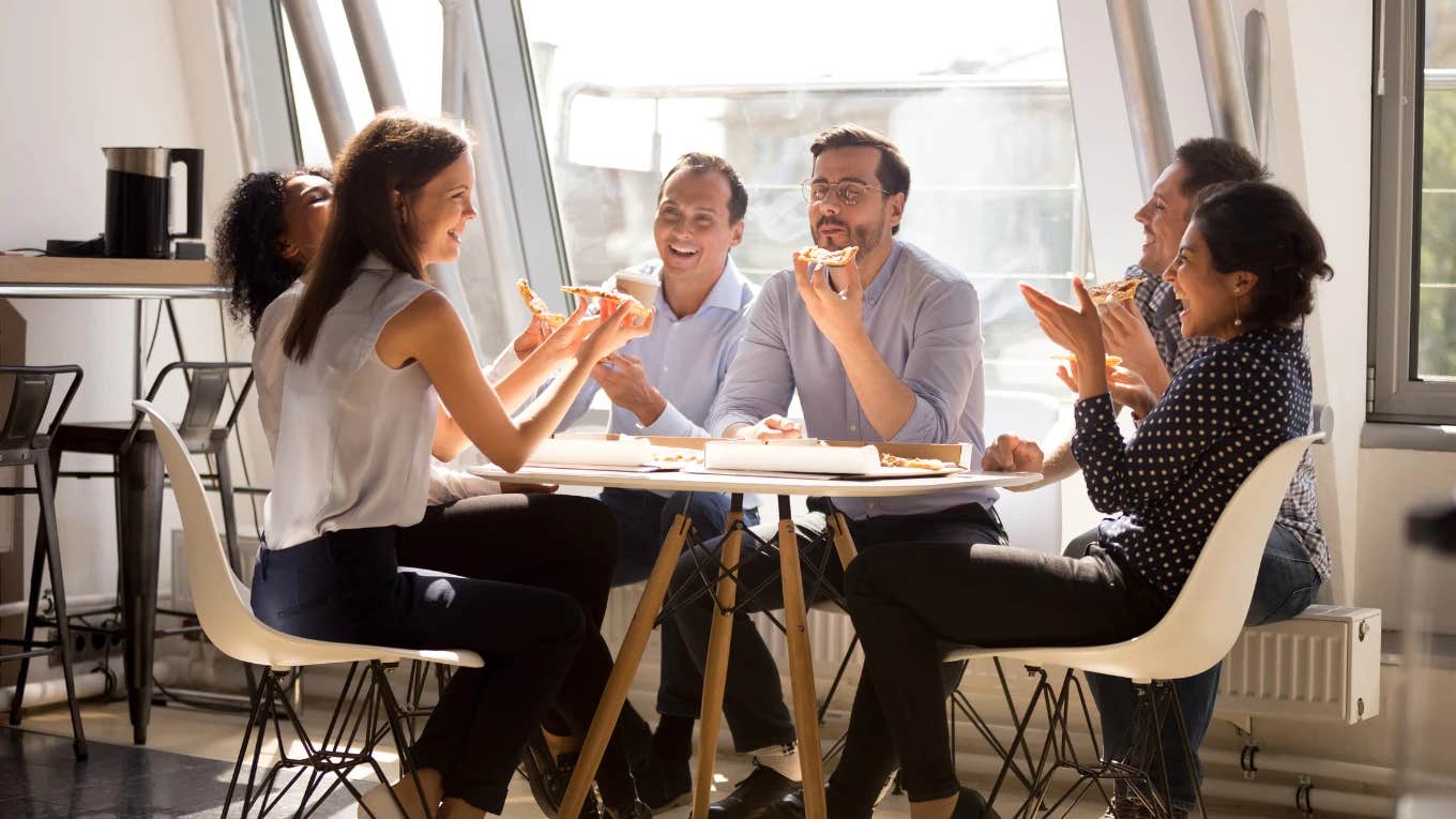 people eating around dinner table