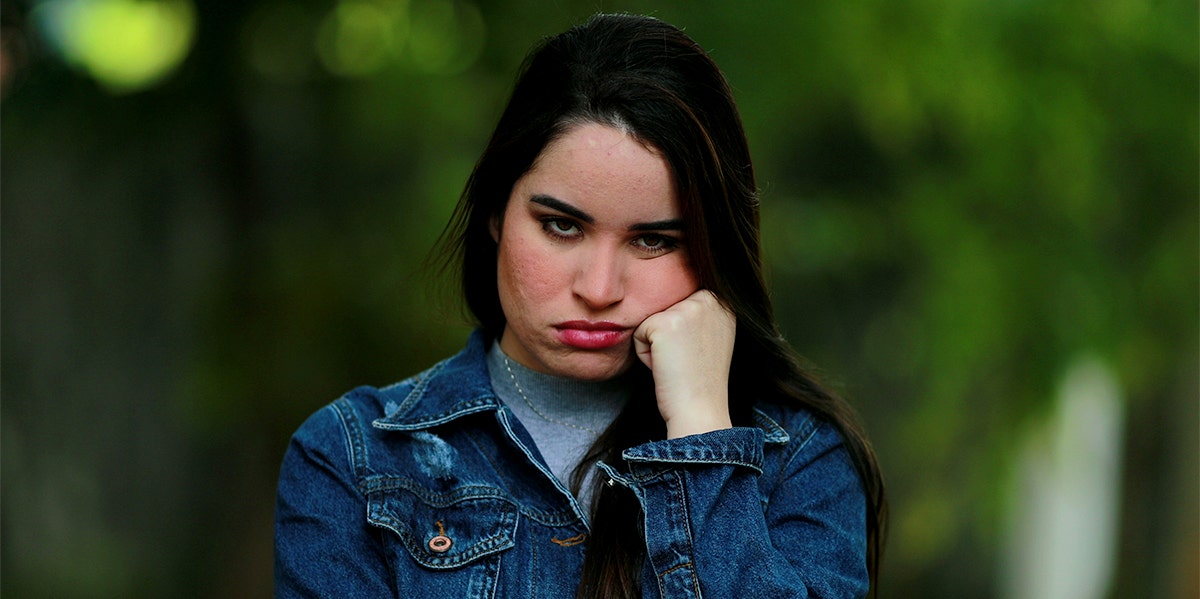 woman making a disgusted face