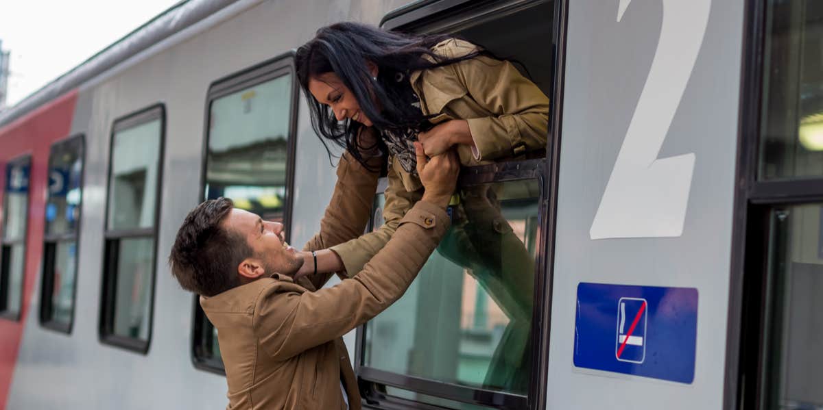 couple saying goodbye at a train