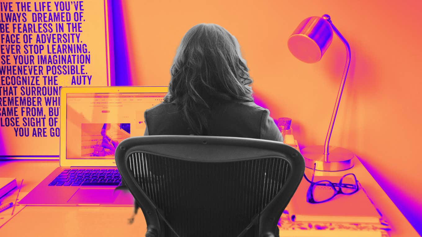 woman sitting at a desk