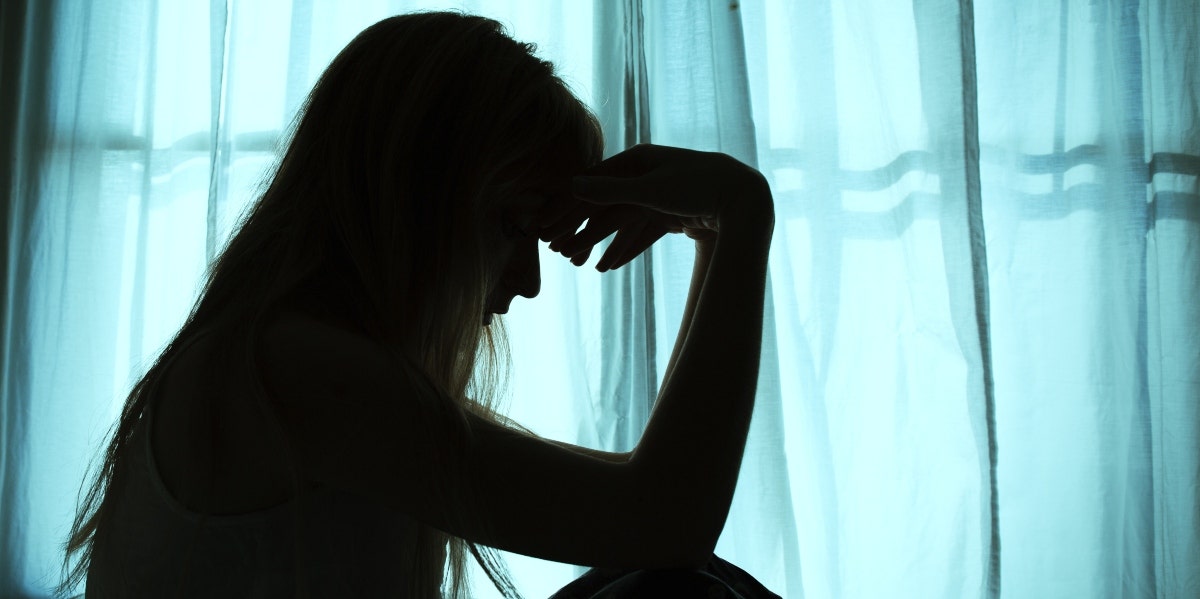 divorce and suicide dark silhouette of woman by a window