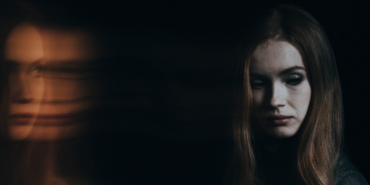 depressed woman in the dark