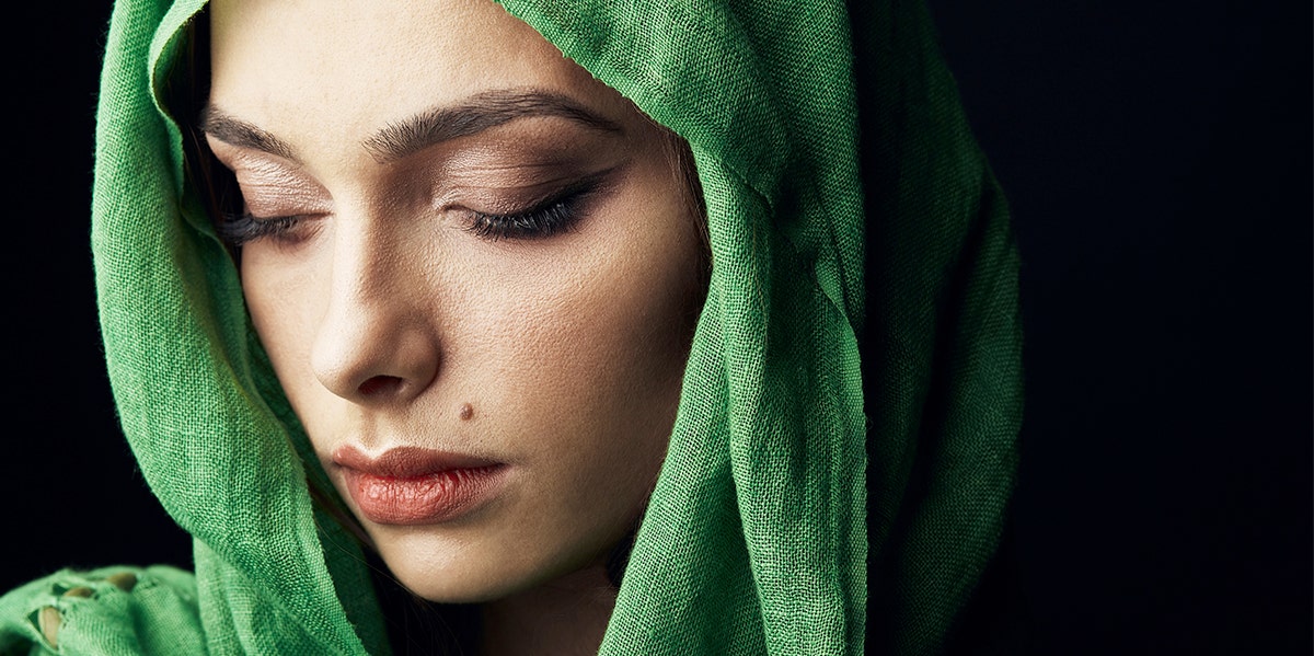 photo of woman in green shawl