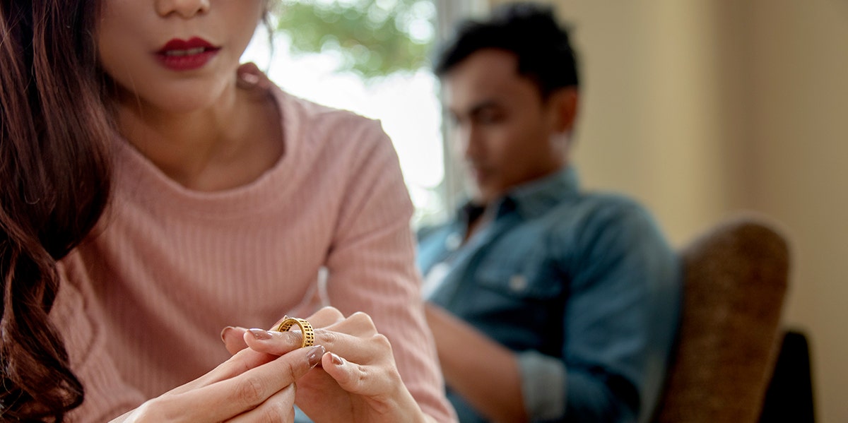 woman looking at ring