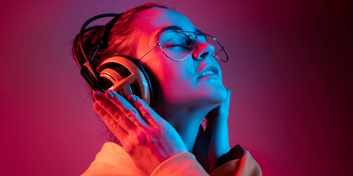 woman listening to headphones