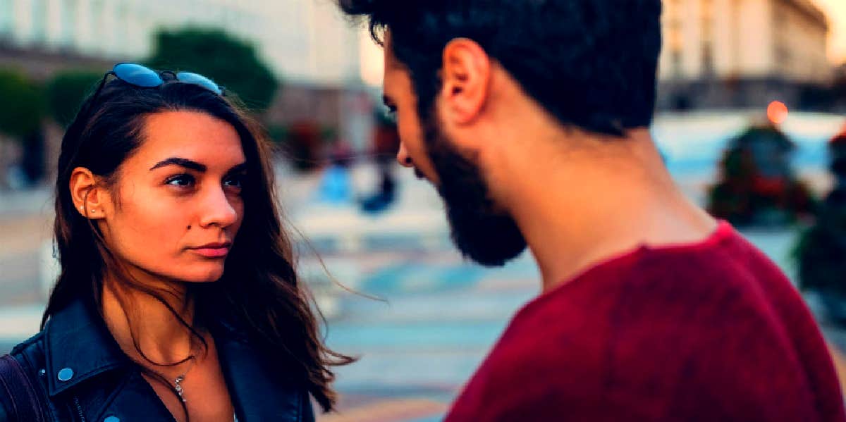 woman looking at man wondering how long to wait when he says he needs space