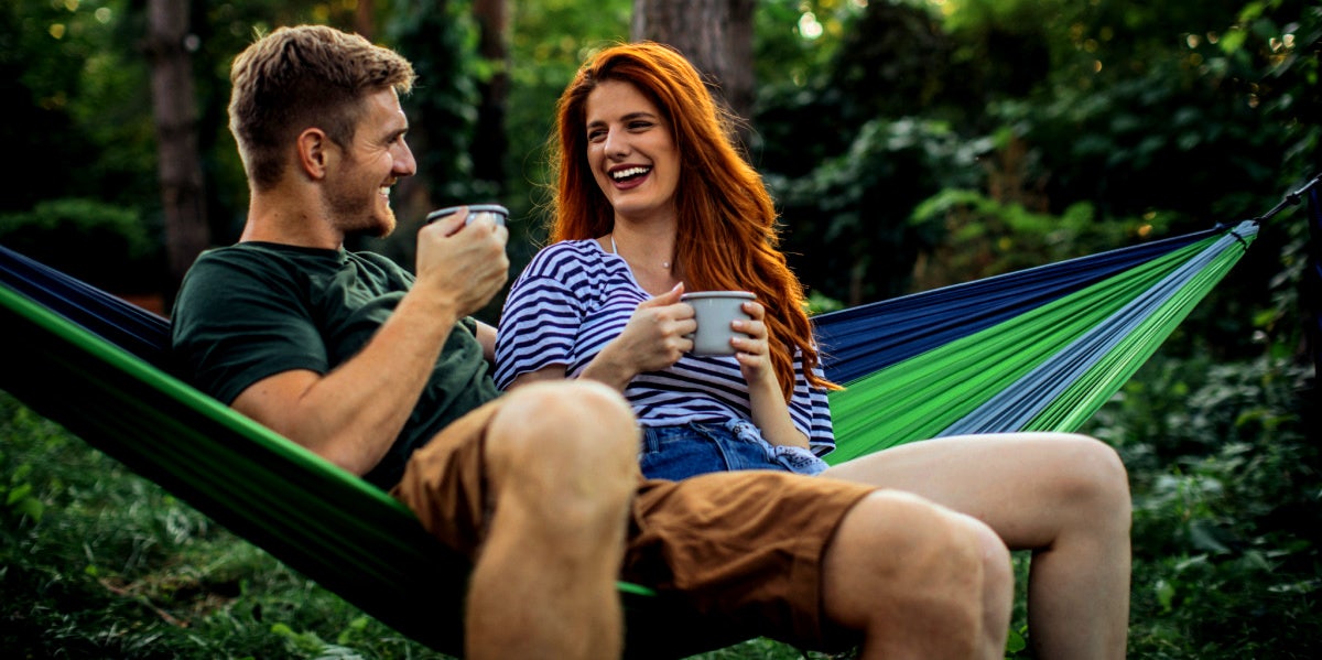 friends with benefits sitting in hammock together