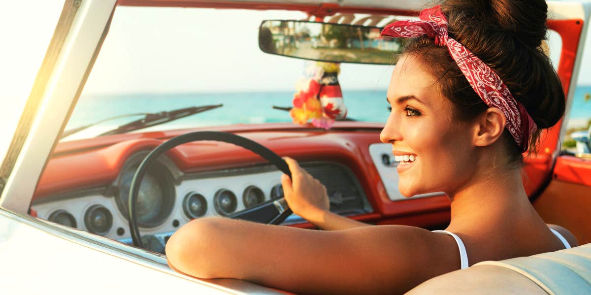 happy woman in car