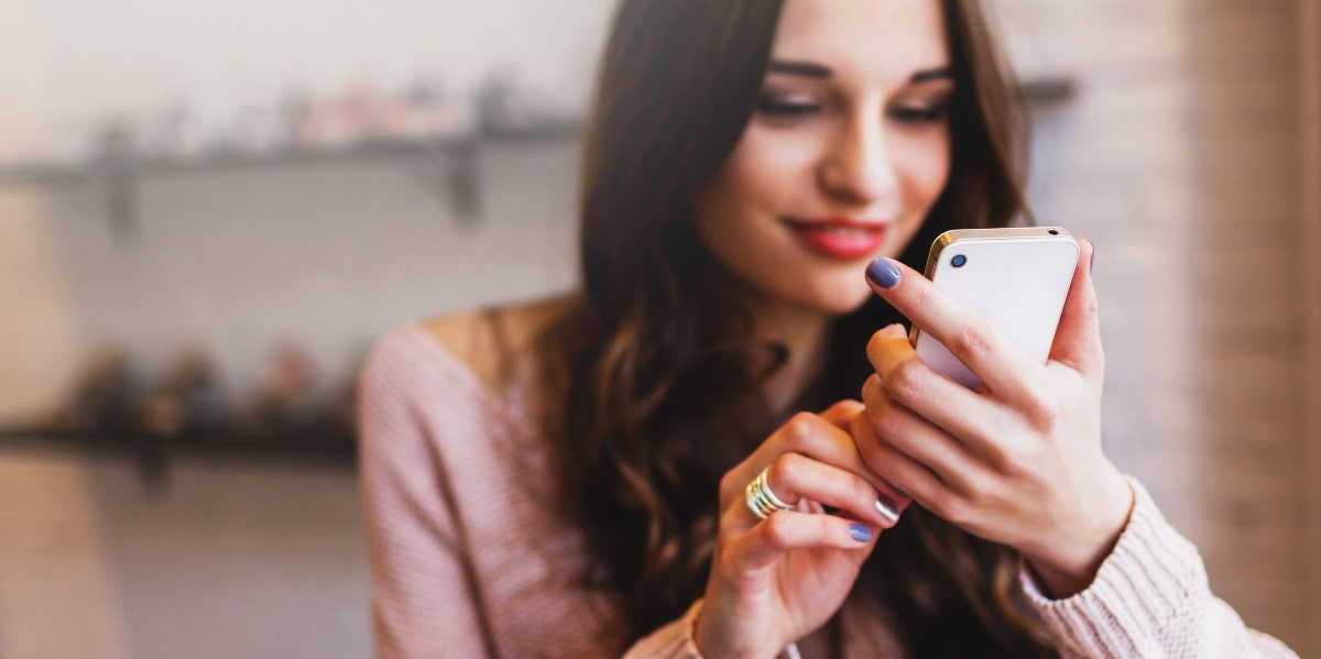 woman using smartphone