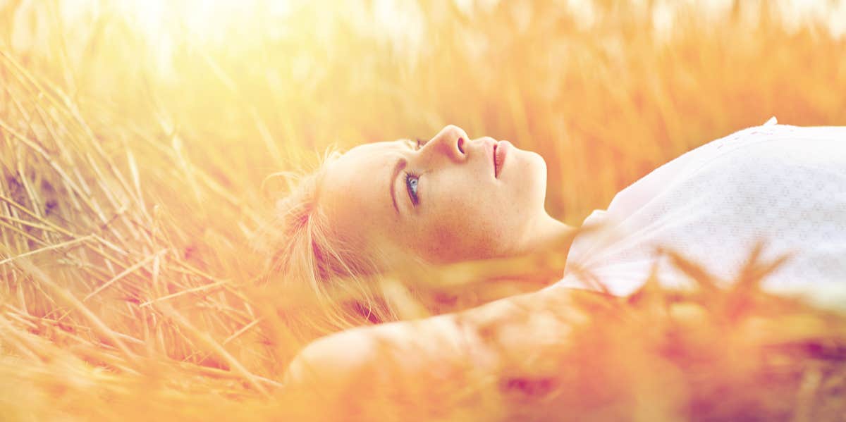 woman in a field dreaming