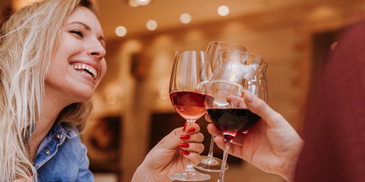 woman toasting with wine