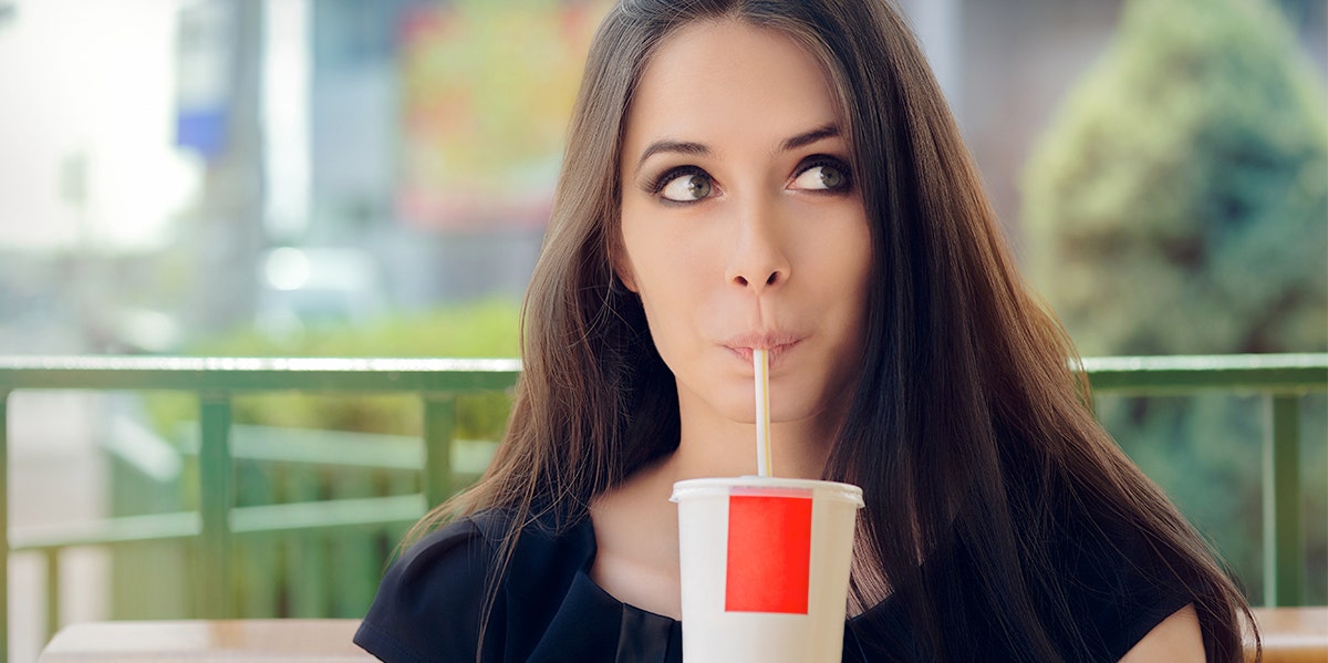 woman drinking soda