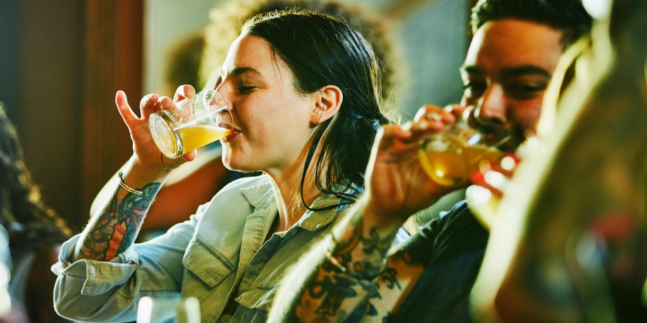 two people leisurely drinking