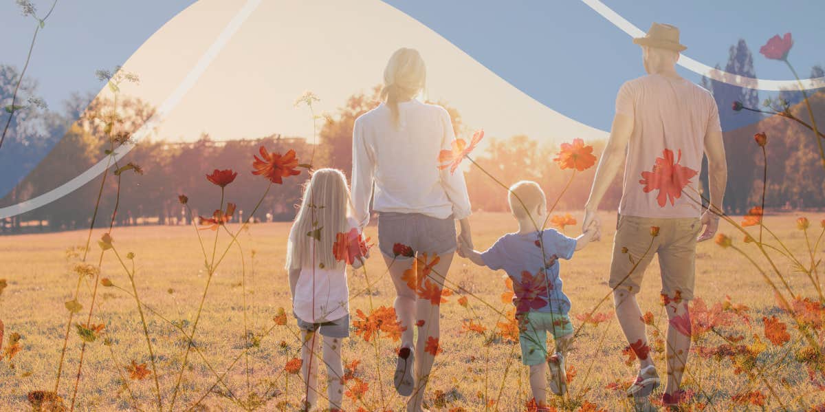 Family walking through a field